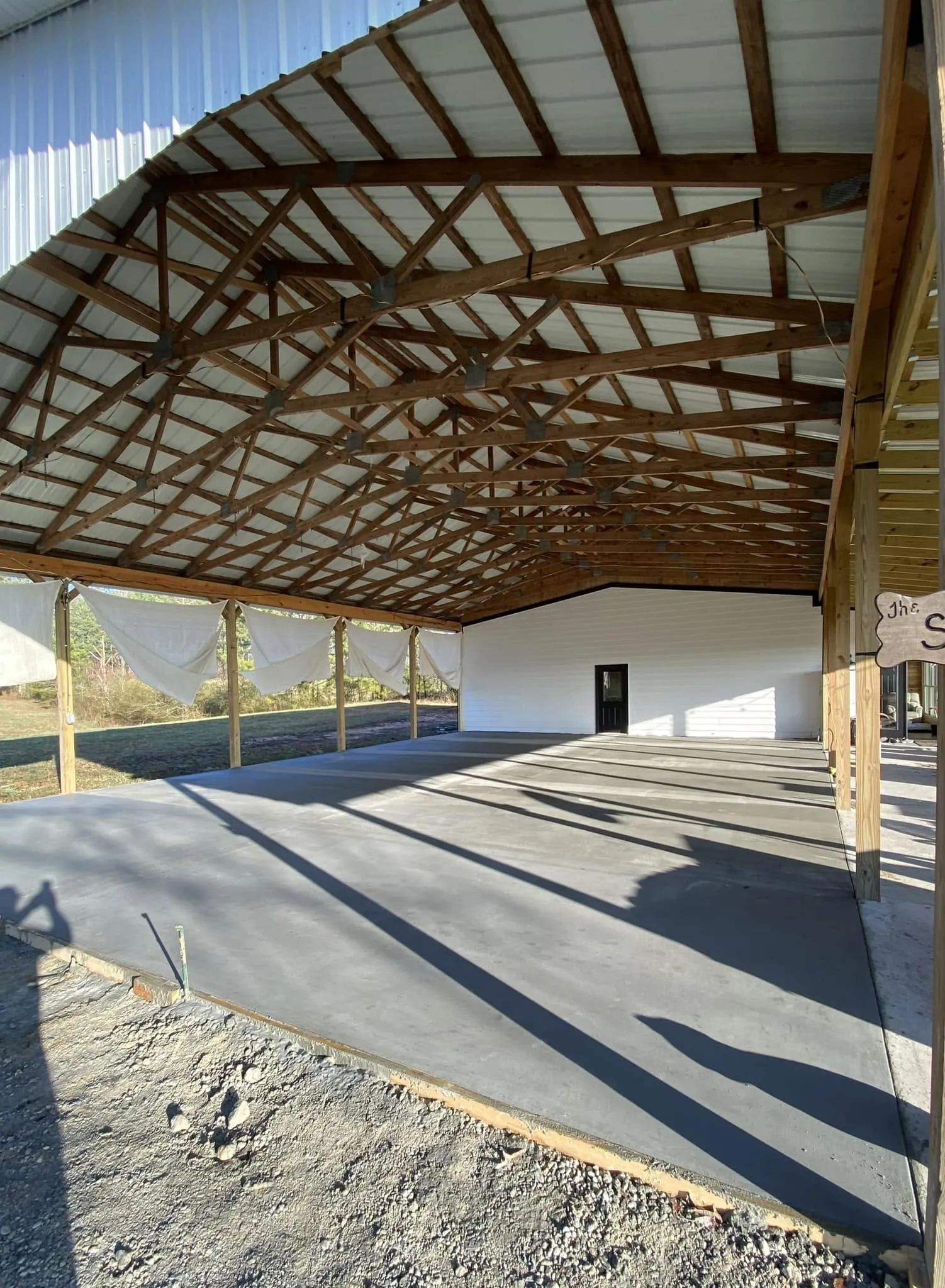 Poured and finished concrete slab inside a pole barn